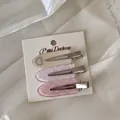 Set of 3 acrylic duckbill hair clips featuring heart patterns and rhinestone accents - Three-Piece Set / Rice Pink