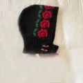 Vintage black knitted balaclava hat with red rose pattern and wooden buttons - One Size / Black