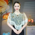 Elegante scialle in rete con paillettes dorate e frange per abiti da sera e galà. - Top / Taglia unica / Champagne