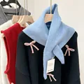 Light blue wool blend knitted triangle scarf featuring cute pink bow decorations - Ice Blue