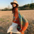 Women's stylish oversized knit patterned shawl poncho in colorful vintage geometric design - Graffiti Orange