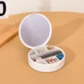 Boîte à bijoux blanche portable avec miroir pour bagues, colliers et rouges à lèvres. - Rond / 10x3cm / Blanc