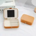 Orange PU leather jewelry storage box with mirror and multi-slot interior - Khaki