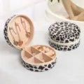 Runde tragbare Schmuckschatulle mit Leopardenmuster und Reißverschluss für Ringe und Ketten - Leopardenprint