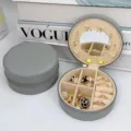 Elegante joyero redondo de cuero PU gris con espejo para anillos y para pendientes - Estilo Espejo Redondo / 10*10*5 / Gris