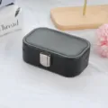 Compact black portable jewelry box organizer with silver metal clasp for travel use - PU Leather Snap Button Style / Black