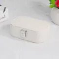 Elegant cream-colored portable travel jewelry organizer box for rings and accessories - Cross Grain Snap Button Style / White