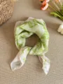 Detailed macro view of fresh green bow print on a lightweight cotton linen scarf - Lime Green