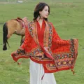 Red ethnic style shawl for women featuring traditional embroidery patterns and fringe tassels - 181