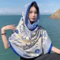 Ethnic style blue and cream elephant print silk scarf worn as headscarf - L215-2