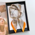 Floral printed 70cm silk-like square scarf featuring an elegant orange border detail. - 70cmx70cm / Sketch Floral - Orange Frame