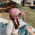 Elegant colorful floral cotton linen headscarf bandana for women in outdoor picnic setting - HyunA Floral