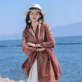 Thick ethnic paisley shawl scarf worn by a model in a scenic seaside travel setting - 65*200cm / Vintage Paisley-20