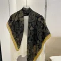 Detailed view of the elegant black and gold paisley pattern on a large 90cm square scarf - Black Gold Paisley / 90*90cm