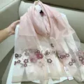 Detail of pink silk blend scarf featuring floral embroidery and glittering gold hem - 180cm / Pink