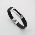 Men's fashion punk style black silicone bracelet with polished stainless steel accent. - Silver