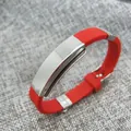 Stylish red silicone bracelet featuring a durable polished stainless steel plate detail - Red