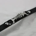 Minimalist black leather bracelet with silver fishbone charm and metal studs. - Unique Fishbone Style (10)