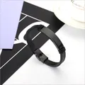Elegant black braided leather bracelet featuring a sleek black metallic ID plate - Black Glossy ID Plate Woven Style