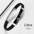 Black silicone zodiac bracelet featuring Libra sign and stainless steel clasp - Libra