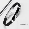 Black silicone zodiac bracelet featuring Capricorn engraving and stainless steel accent - Capricorn