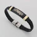 Stylish braided black leather bracelet featuring gold accents and a treble clef musical design - Music Note