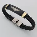 Handmade vintage braided black leather bracelet featuring a golden eagle plate and clasp - Eagle