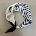Elegant black and white striped silk square scarf featured with a large glossy pearl accessory - White Striped / 47cm