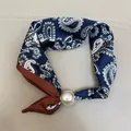 Elegant navy blue paisley printed silk scarf for women featuring a large white pearl buckle - Navy Paisley / 47cm