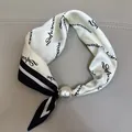 Elegant white silk scarf with black script print and large pearl buckle accessory - Alphabet / 47cm