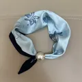 Elegant light blue floral silk scarf for women featuring a large white pearl buckle - Sky Blue Gardenia / 47cm
