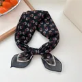Elegant vintage navy blue floral silk square scarf used as a stylish neck tie or hair band - Literary Black Floral