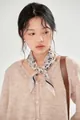 Close-up of a vintage French floral cotton square scarf worn by a model - Beige Gray Flower / 58*58cm