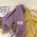 Detailed close-up of a soft purple imitation cashmere scarf with stylish fringes - 38-180cm / Lavender