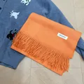 Premium cozy orange solid color scarf with long tassels for elegant winter warmth and style - Orange
