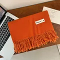Cozy orange imitation cashmere winter scarf featuring tassels and a unique patch - 200cm (Includes Tassels) / Orange