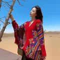Bohemian ethnic style red tassel poncho shawl perfect for desert travel and photos - Flower Path Red