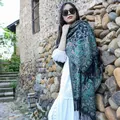Traditional ethnic paisley thick shawl scarf in teal with fringes worn by model outdoors - 65*200cm / Full Paisley Green