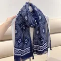Close-up of vintage blue and white floral scarf with ethnic paisley print and tassels - Blue and White / 180cm