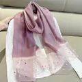 Detailed view of lavender faux silk scarf featuring delicate pearl embellishments - 180cm / Taro Purple