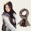 Vintage floral contrast long scarf shown on a model and as a flat product detail view. - 180cm / Brown Floral