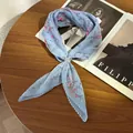 Close-up of pleated blue floral scarf with delicate silk cotton texture and ring clasp - Pleated Square Scarf (With Scarf Ring) / 70cm / Light Blue Floral