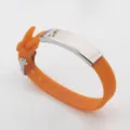 Adjustable orange silicone autism awareness bracelet with stainless steel plate and ribbon - Orange