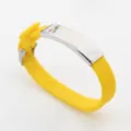 Yellow silicone bracelet with stainless steel plate and colorful autism puzzle ribbon - Yellow