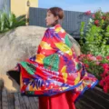 Vibrant red ethnic shawl featuring a tropical leaf print for travel photography - 180x100cm / Colorful Leaves
