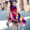 Vibrant ethnic geometric shawl with tassels, perfect for beach travel photography - 180x100cm / Rainbow Patchwork