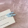 Macro view of light blue duckbill hair clips with sparkling rhinestone bowtie detail - Bowknot Rhinestone Duckbill Clip / 2 Pcs/Set / Blue