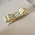 Vue détaillée de la pince à cheveux en tissu à fleurs jaunes multicouches pour fille - Polka Dot Pattern(7#) / Pince Banane / Jaune