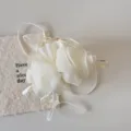 Detailed view of the layered mesh ruffles and sturdy claw on this off-white hair clip. - Beige Cloud Mesh Flower Style / Beige Cloud Mesh Flower Claw Clip