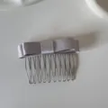Macro detail of a lavender satin bow hair comb featuring elegant metal teeth design - Bow Hair Comb / Gray